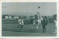 Basketball match, 1967. Attila jumping for the ball, Mr O'Connor in the scarf.